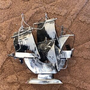 Black and Silver Metal Ship Sculpture replica of The Nina
